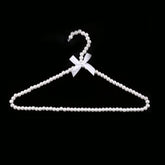 Cintre à perles esthétique