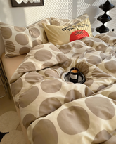 Parure de lit verte à gros pois