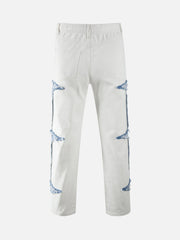 Jean droit déchiré à blocs de couleurs