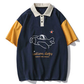 Polo à motif graphique de poupée aux couleurs contrastées