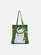 Strickhandtasche mit Entenmuster