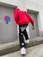 Baggy-Jeans mit Glücksklee-Stickerei - 1162