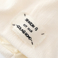 Bonnet tricoté carré à lettres