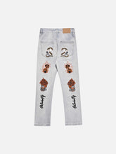 Skull Flame Monogram Embroidered Slim Fit Jeans