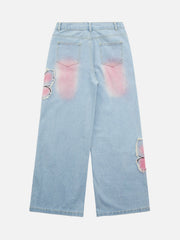 Jeans mit Batik-Schmetterlingsstickerei und Raw Edge