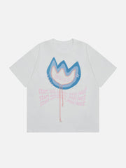 T-shirt à fleurs brodées avec serviette