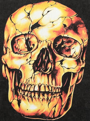 T-shirt rétro délavé et vieilli avec tête de mort dorée foncée