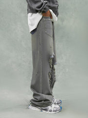 Washed Ripped Jeans With Reverse Slip Pockets