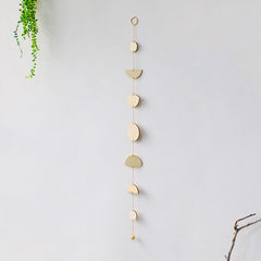 Décoration murale en bois avec phases de la lune