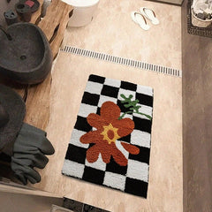 Tapis décoratif à carreaux et fleurs oranges