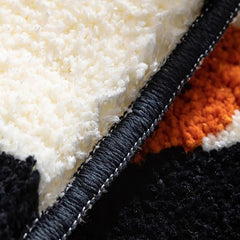 Tapis décoratif à carreaux et fleurs oranges