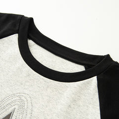 T-Shirt mit Stickerei und Patchwork-Ärmeln