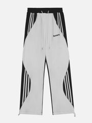 Pantalon de survêtement à empiècements irréguliers de couleur contrastée