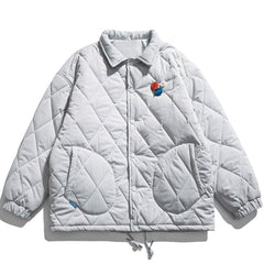 Doudoune brodée autour des lettres