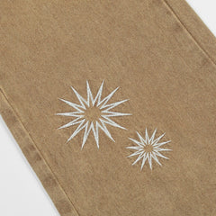 Jean délavé avec broderie