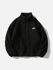 Sherpa-Mantel aus Lammfell mit Etikett