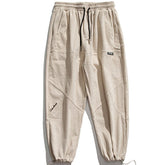 Pantalon de survêtement à carreaux brodés de lettres