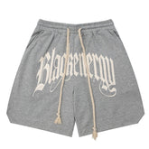 Lange Shorts mit Kordelzug und Buchstabenstickerei