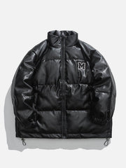 Einfarbige Lederjacke mit M-Patch-Stickerei