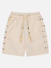 Short à cordon de serrage et boutons-pression en métal