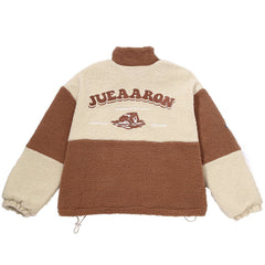 Sherpa-Wintermantel mit Monogramm-Stickerei in Kontrastfarbe