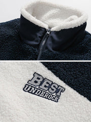 Sherpa-Wintermantel mit Patchwork-Stickerei und Buchstaben