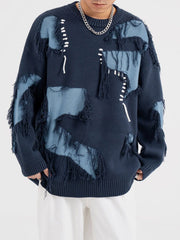 Pull à pompons patchwork