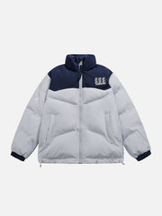 Wintermantel mit Portrait-Stickerei