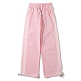 Pantalon de survêtement à empiècements latéraux à motif zèbre