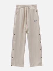 Einfarbige Jogginghose mit Knopfleiste