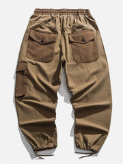Pantalon cargo de couleur unie