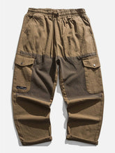 Pantalon cargo uni à poches multiples
