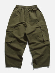 Pantalon cargo à poches de couleur unie