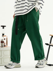 Pantalon cargo à bretelles de couleur unie