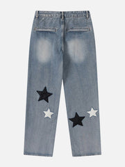 Jeans mit Sternen-Patchwork-Print in Kollisionsfarbe