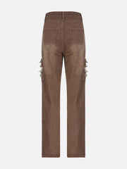 Jean évasé taille basse avec patch déchiré