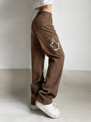 Jean évasé taille basse avec patch déchiré