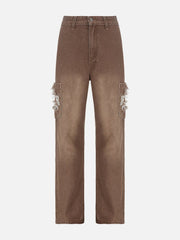 Jean évasé taille basse avec patch déchiré