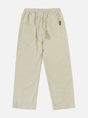 Pantalon brodé gaufré