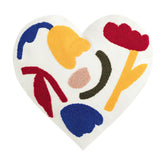 Coussin en forme de cœur touffeté de fleurs modernes