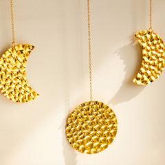 Geschmiedete goldene Mondphasen-Wanddekoration
