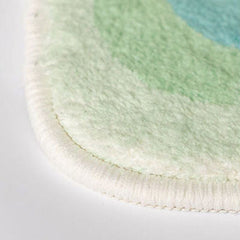 Pastellfarbener Blob-Teppich mit unregelmäßigem Akzent