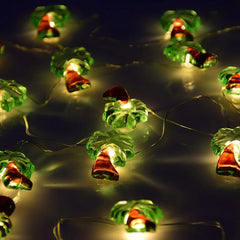 Lichterkette mit tropischer Palme