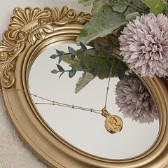 Vintage Golden ArtHoe Mirror