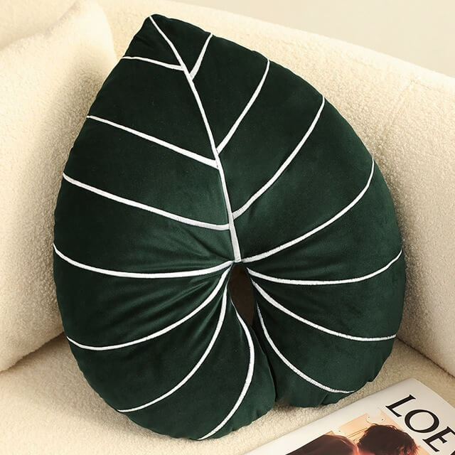 Coussin en peluche à feuilles tropicales