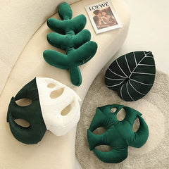 Coussin en peluche à feuilles tropicales