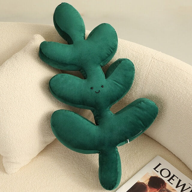 Coussin en peluche à feuilles tropicales