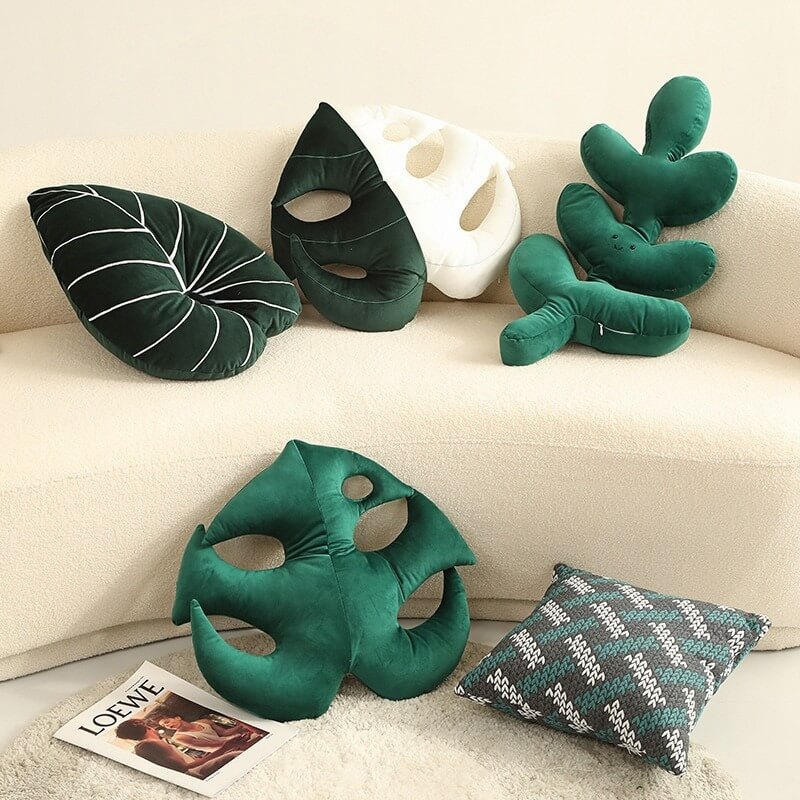 Coussin en peluche à feuilles tropicales