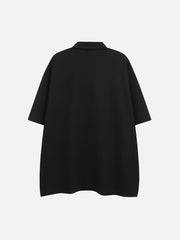 T-shirt à col polo et bretelles brodées 