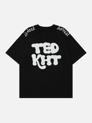 T-Shirt mit beflocktem, besticktem Buchstaben 